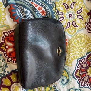 Navy blue Coach makeup bag